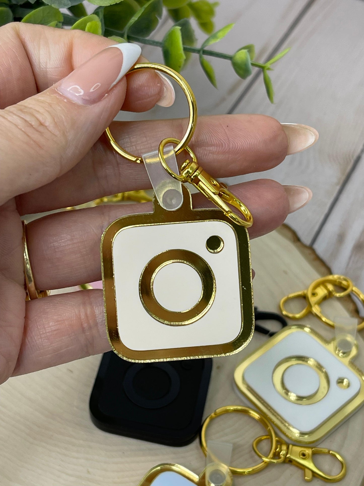 Stylish NFC keychain in a vibrant metallic gold finish, combining elegance and functionality for a bold and customizable accessory.