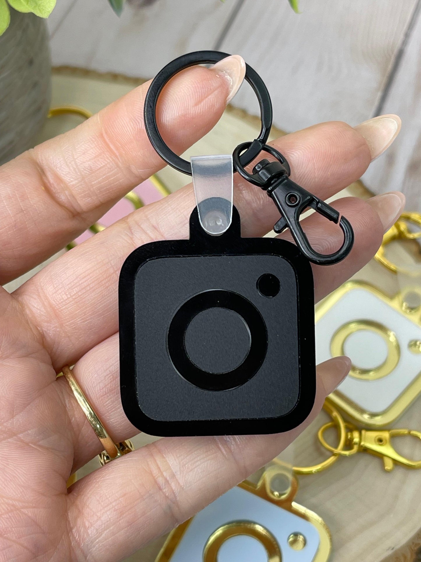 Elegant NFC keychain in a sleek black matte and glossy finish, designed for a sophisticated and unisex style, perfect for modern networking.